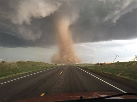Tornado touches down in Colorado, caught during live newscast
